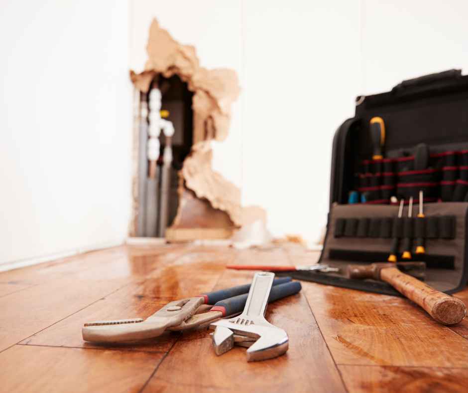 Fixing a hidden plumbing leak behind a wall